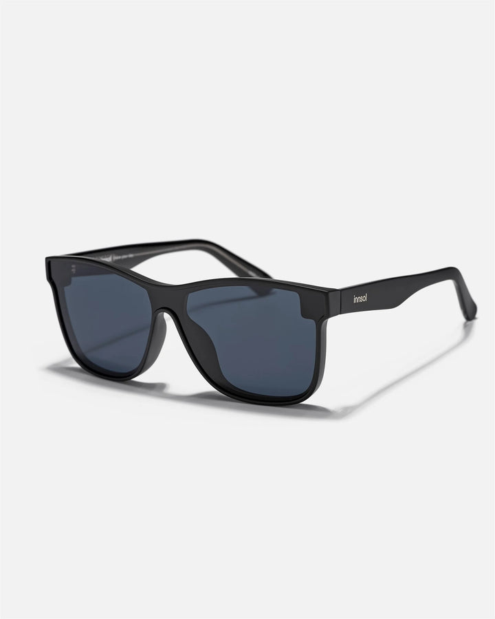 Alternate side angle of innsol Halo sunglasses featuring smooth one-piece shield lens and lightweight frame in matte black