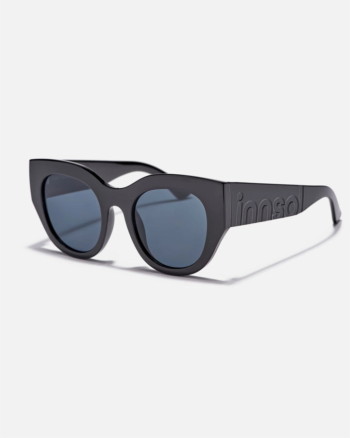 Alternate side angle of innsol Lilly sunglasses featuring oversized cat eye front, chunky temples, and face-framing coverage in gloss black
