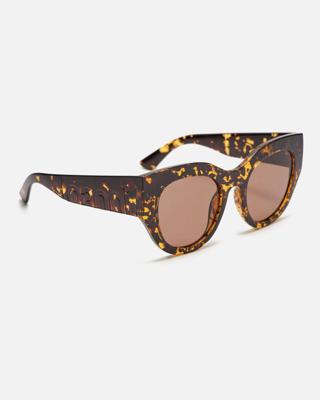 Side view of innsol Lilly sunglasses showing transparent tortoise lightweight frame and brown lenses