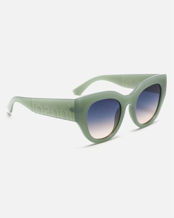 Side view of innsol Lilly sunglasses showing milky green lightweight frame and gradient green lenses
