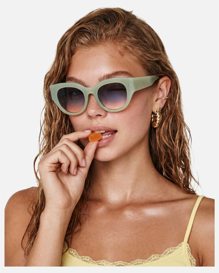 Model wearing innsol Lilly oversized cat eye sunglasses with chunky temples for brunch, resort wear, shopping days, and confident city walks