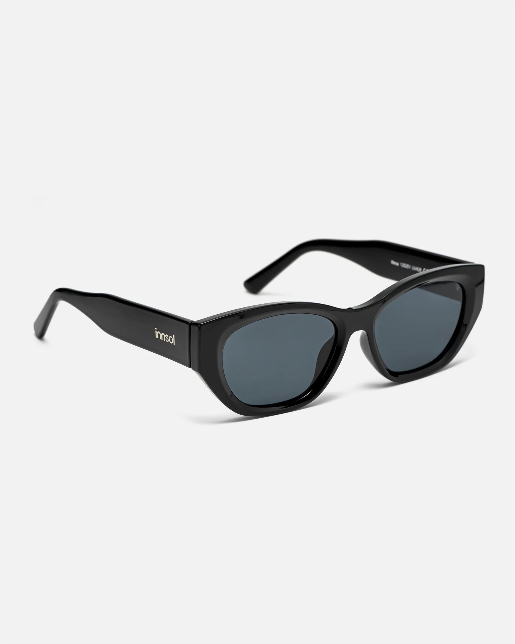 Side view of innsol Mesa sunglasses showing gloss black lightweight frame and black lenses