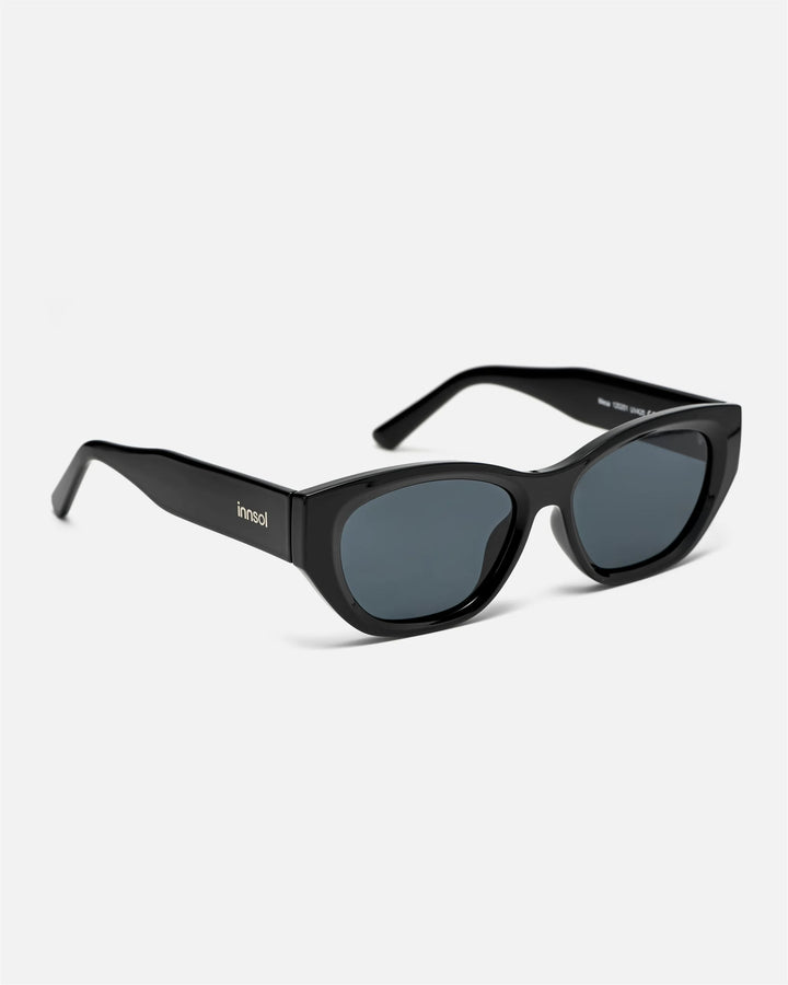 Side view of innsol Mesa sunglasses showing gloss black lightweight frame and black lenses