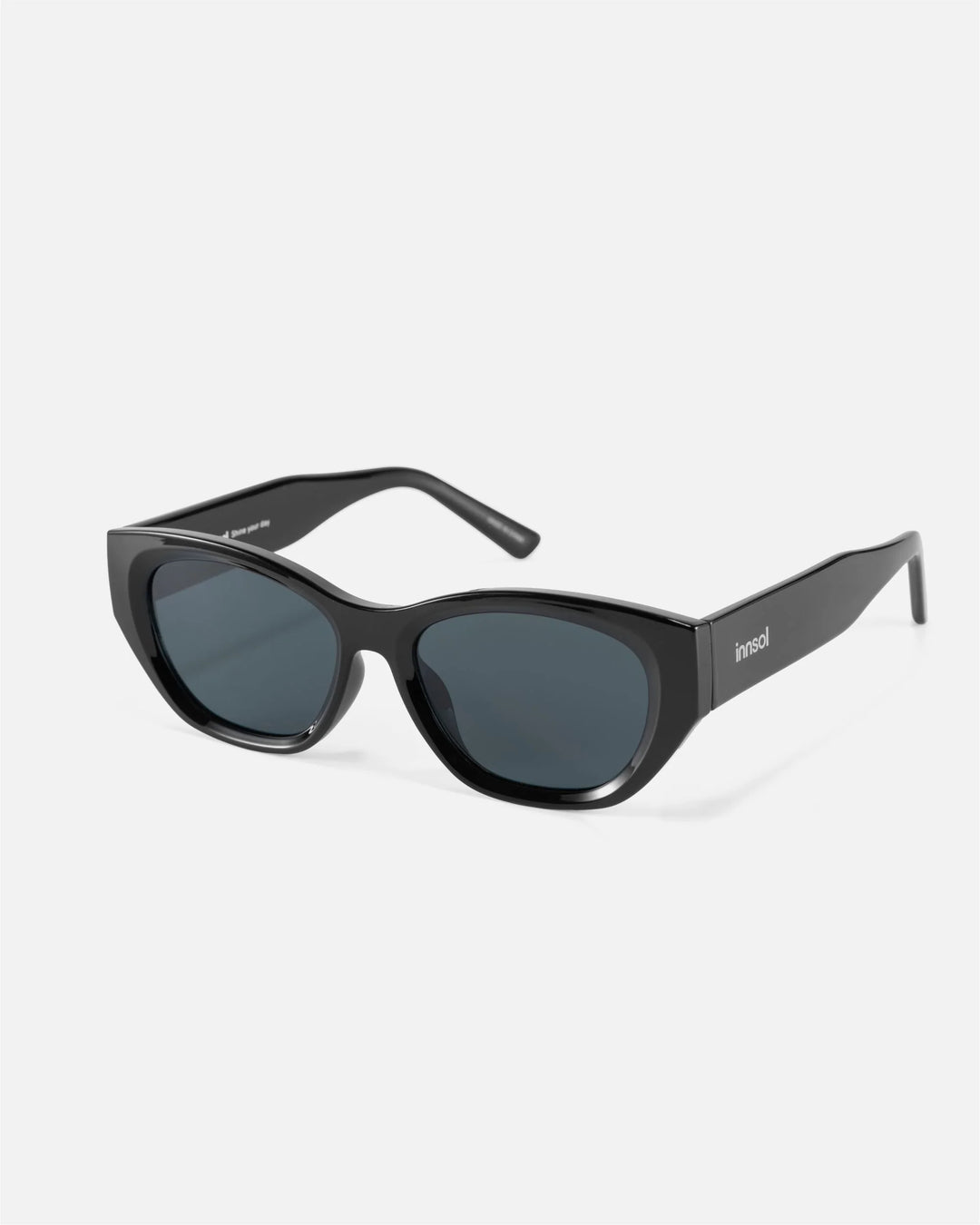 Alternate side angle of innsol Mesa sunglasses featuring upswept cat eye frame and lightweight everyday shape in gloss black