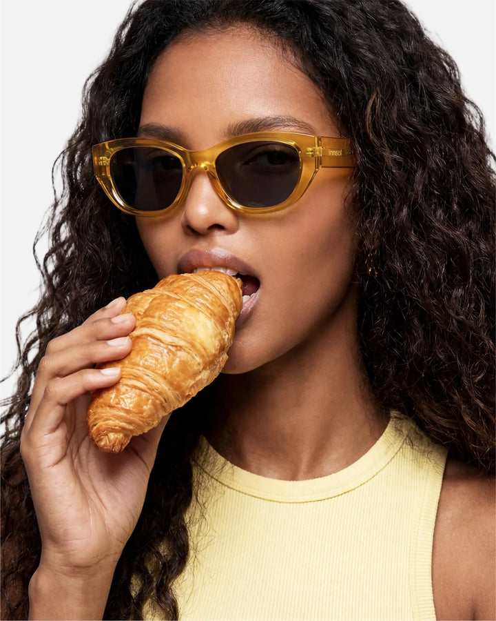 Model wearing innsol Mesa retro cat eye sunglasses for brunch, travel, and polished everyday outfits
