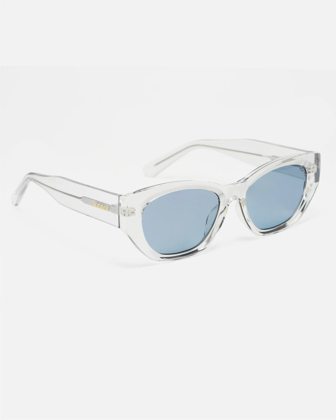 Side view of innsol Mesa sunglasses showing transparent lightweight frame and clear blue lenses