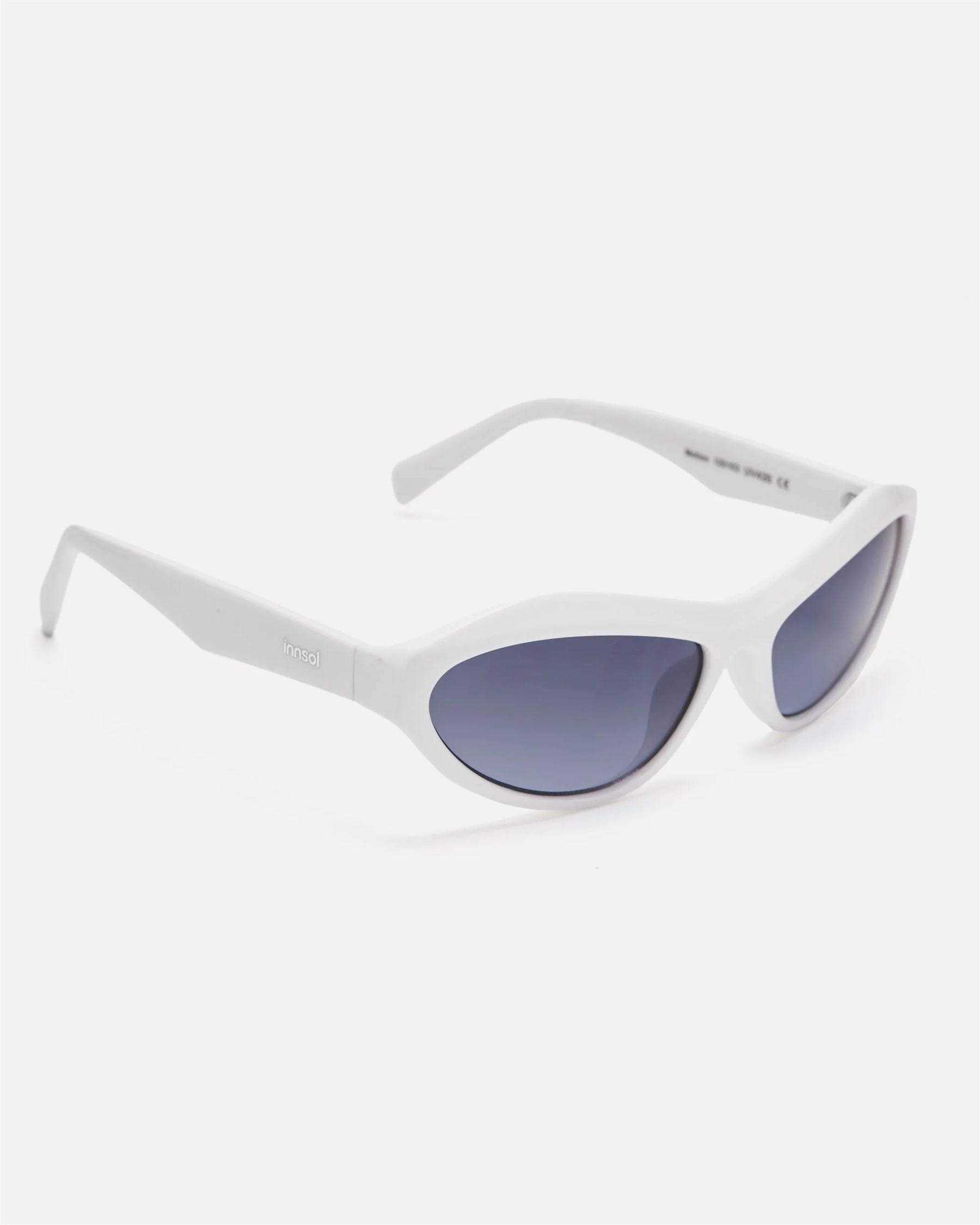 Side view of innsol Motion sunglasses showing transparent pink lightweight frame and pink mirrored lenses