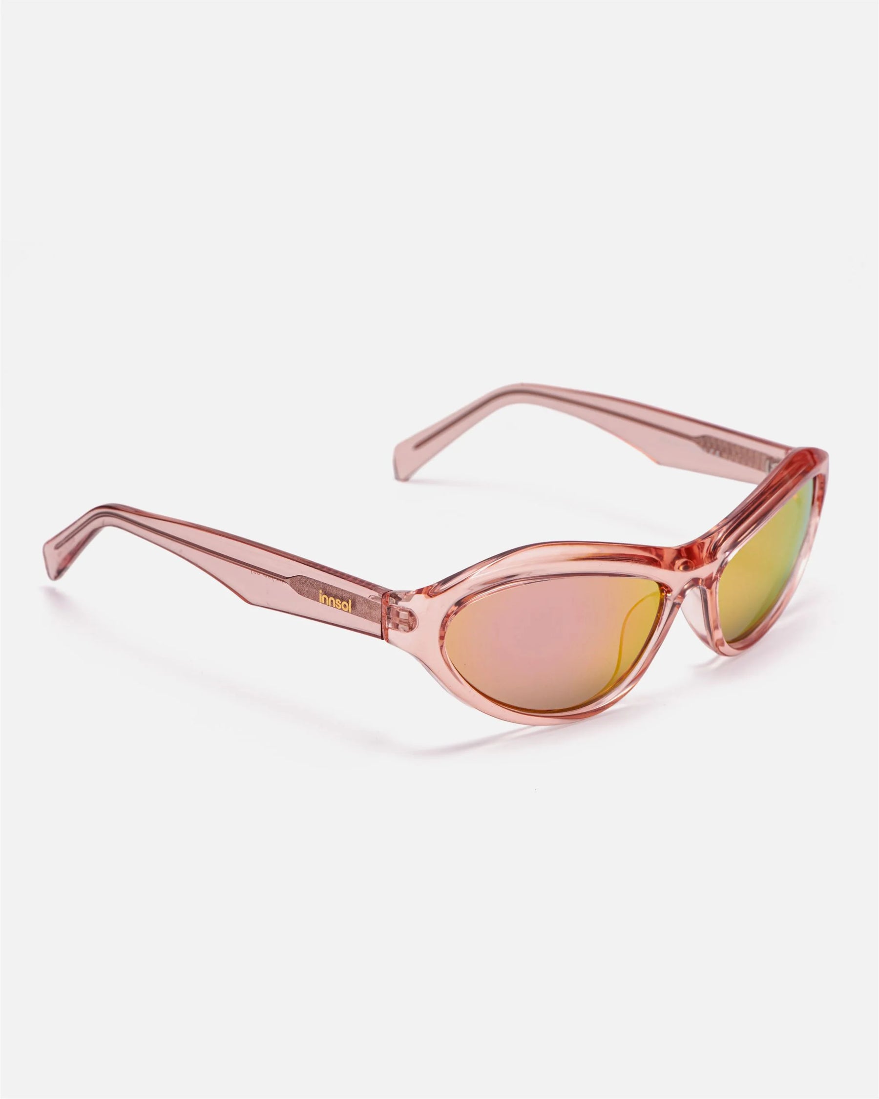 Side view of innsol Motion sunglasses showing gloss white lightweight frame and gray lenses