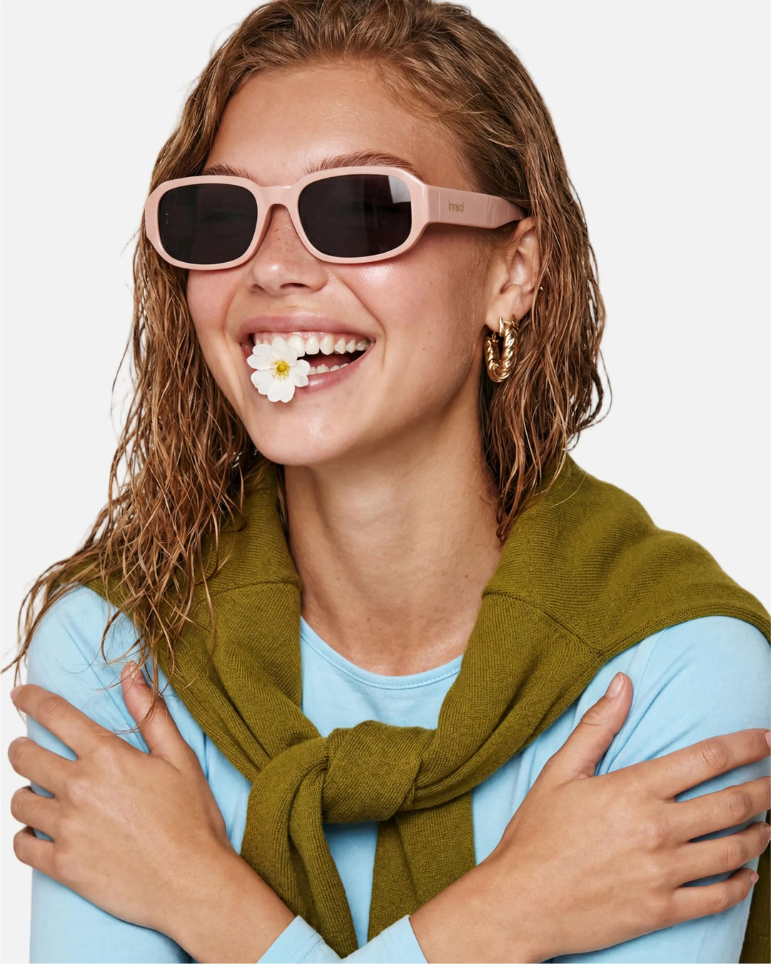 Model wearing innsol Romeo minimalist small rectangular sunglasses for small-face styling, casual city outfits, and Y2K everyday looks