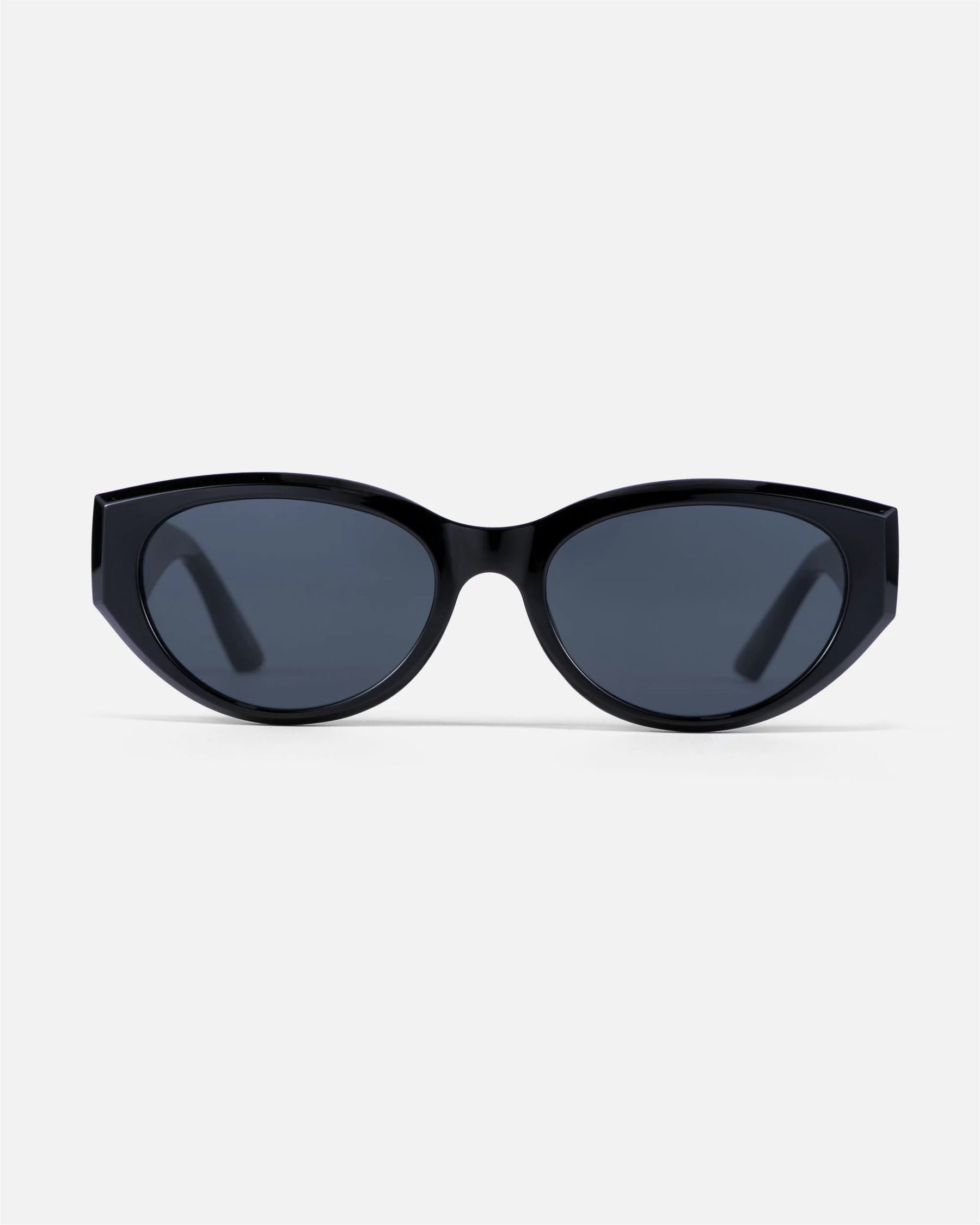 innsol Series modern edgy cat eye sunglasses with gloss black frame and gray UV400 lenses