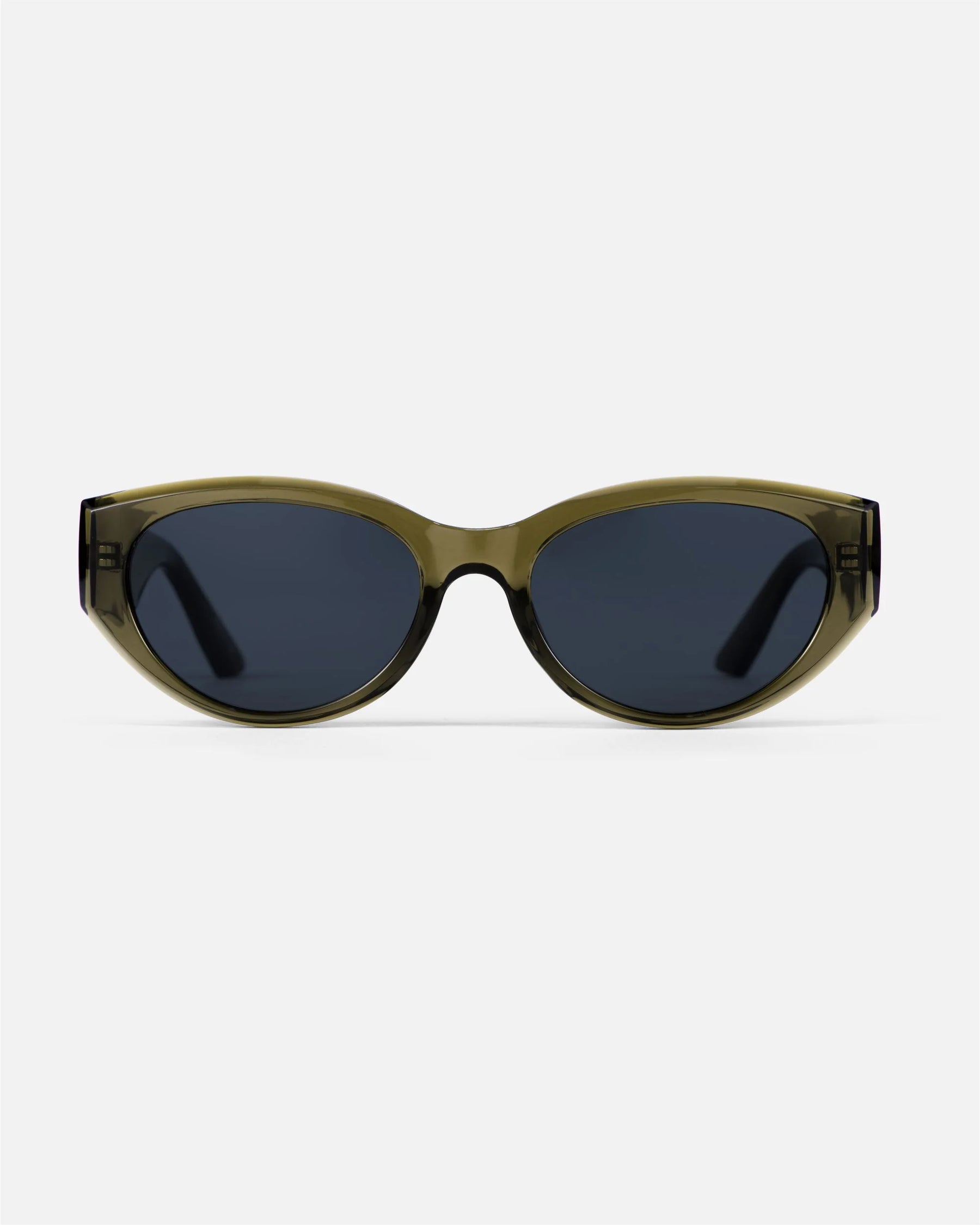 innsol Series modern edgy cat eye sunglasses with transparent green frame and gray UV400 lenses
