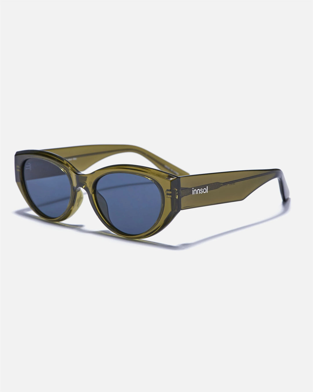 Alternate side angle of innsol Series sunglasses featuring glossy cat eye frame, reinforced hinges, and smooth temples in transparent green