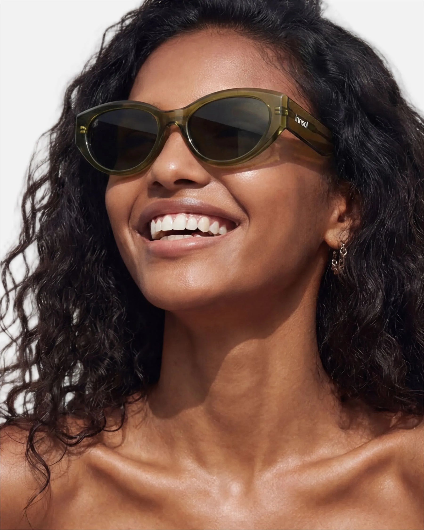 Model wearing innsol Series modern edgy cat eye sunglasses for daily streetwear, brunch looks, and confident city styling