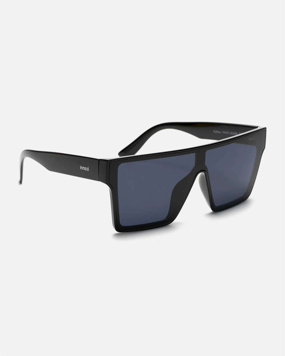 Side view of innsol Sydney sunglasses showing gloss black lightweight frame and gray lenses