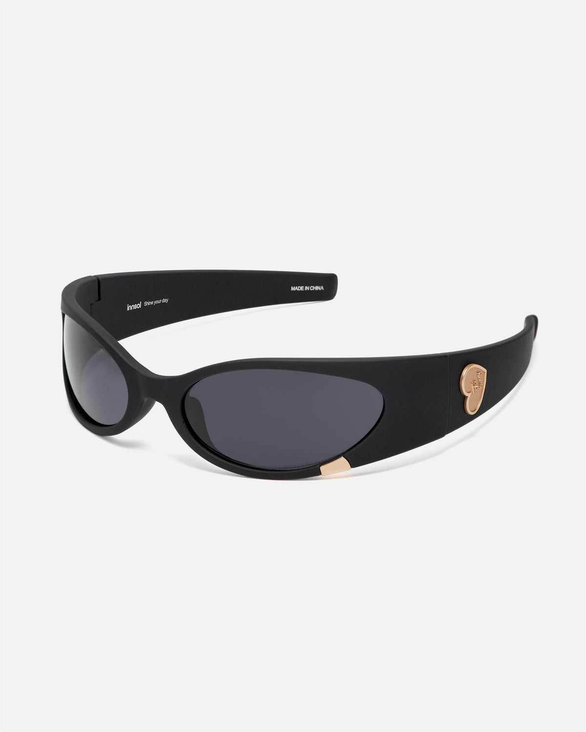 Angled view of innsol Cail Matt Black sunglasses with gray lenses